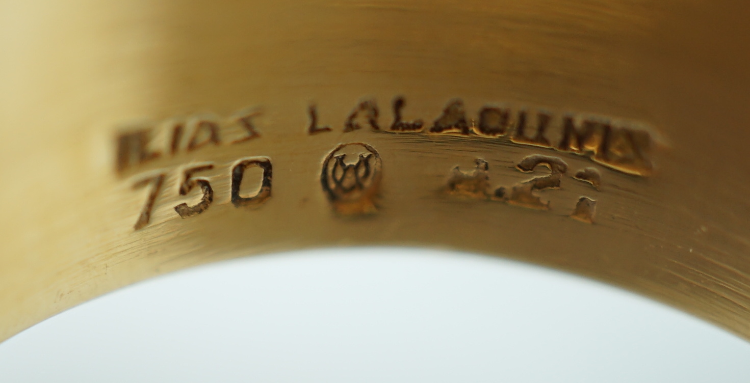 A Ilias Lalaounis 18k gold and four stone emerald set dress ring